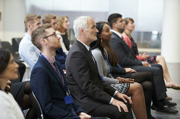 audience-listening-to-speaker-at-conference-presen-PRFAR63-1536x1024-1